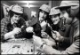 Image of : Photograph - Duncan McKenzie, Bob Latchford, Martin Dobson and another player, playing Cluedo