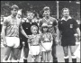 Image of : Photograph - Kevin Ratcliffe, Everton F.C. Captain, with two Everton F.C. mascots, and Brian Robson, Manchester United Captain, the referee and linesmen