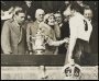 Image of : Photograph - The Duchess of York watched by the Duke, presenting the F.A. Cup to Dixie Dean after Everton's win against Manchester City in the Final at Wembley