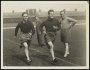 Image of : Photograph - Ted Critchley and George Martin in training with Harry Cooke and George Leyfield, the trainers, looking on